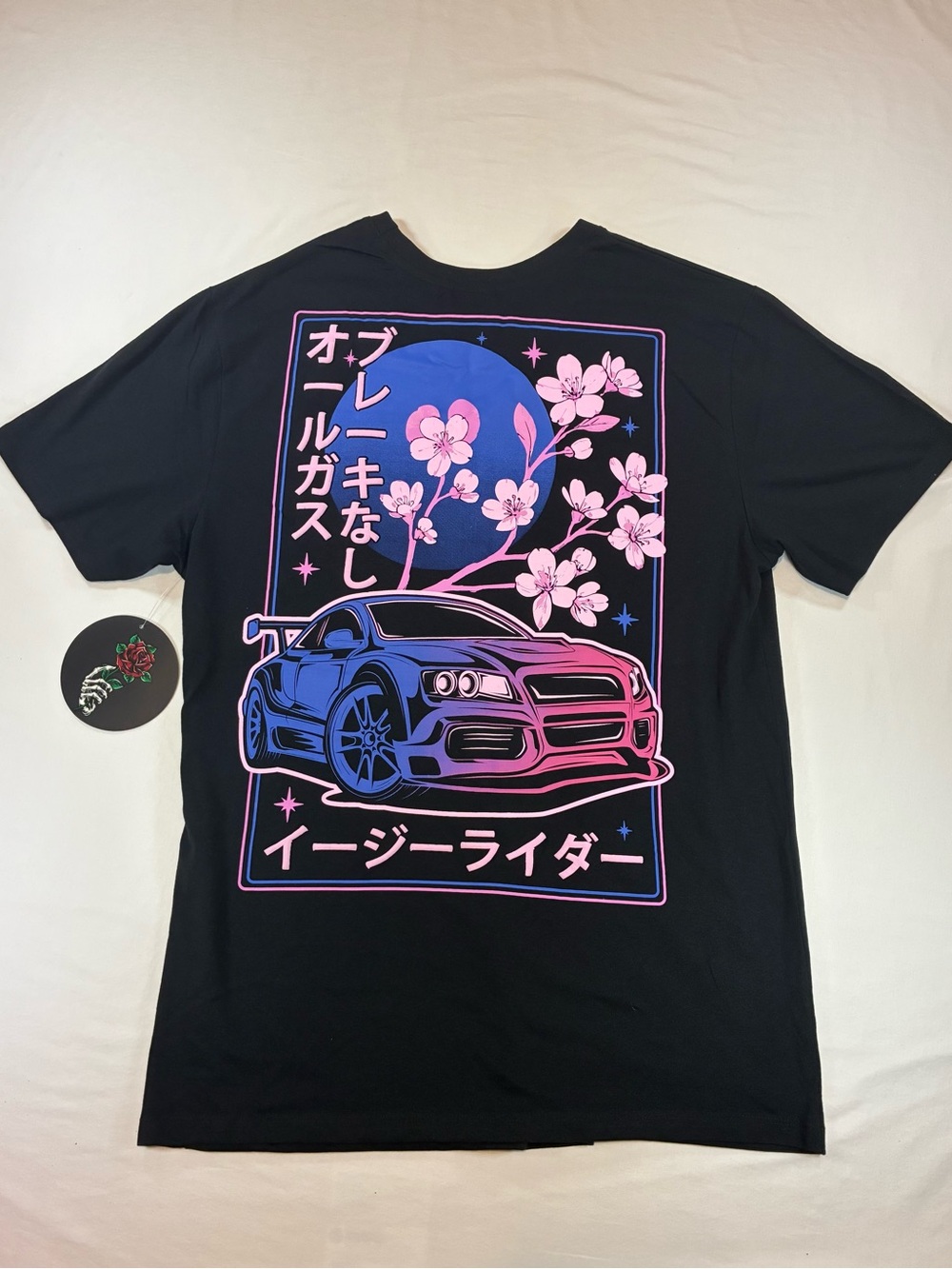 Black Short-Sleeve Graphic Tee with Blue & Pink Racing Car Design